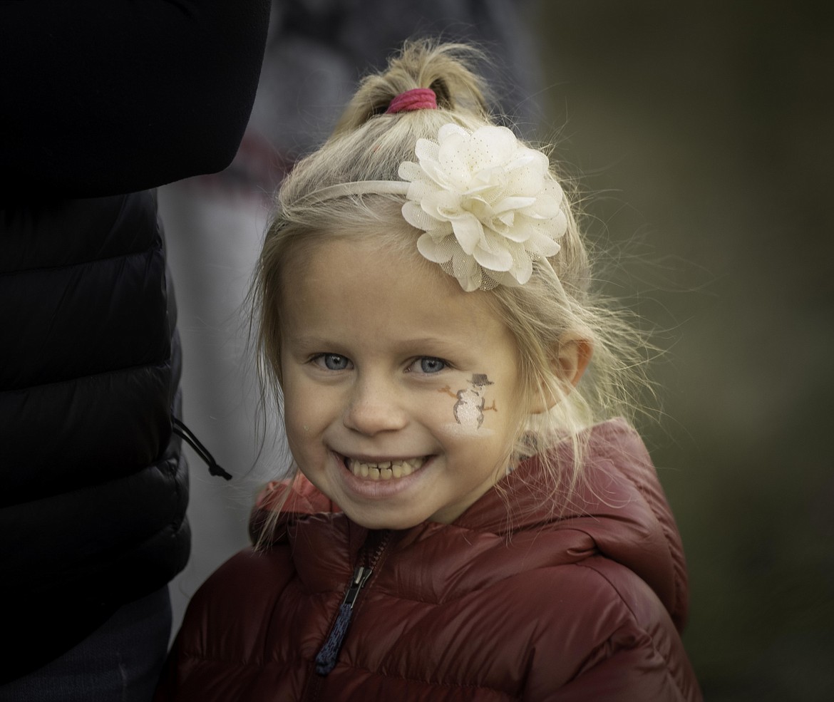 Kinzley Halden, 6, from Paradise has a great time at the Plains Christmas parade.