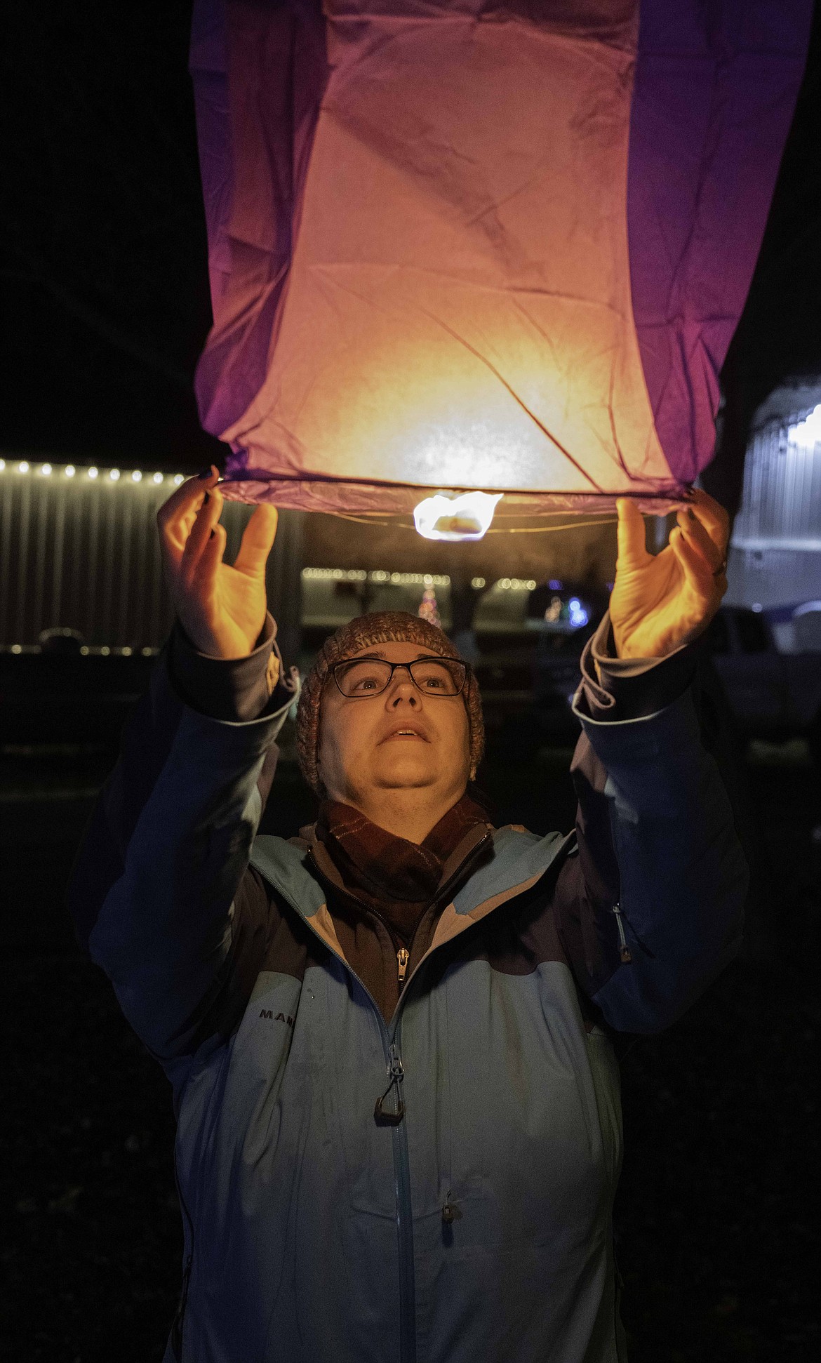 Laura Pickering launches a lantern. (Tracy Scott/Valley Press)