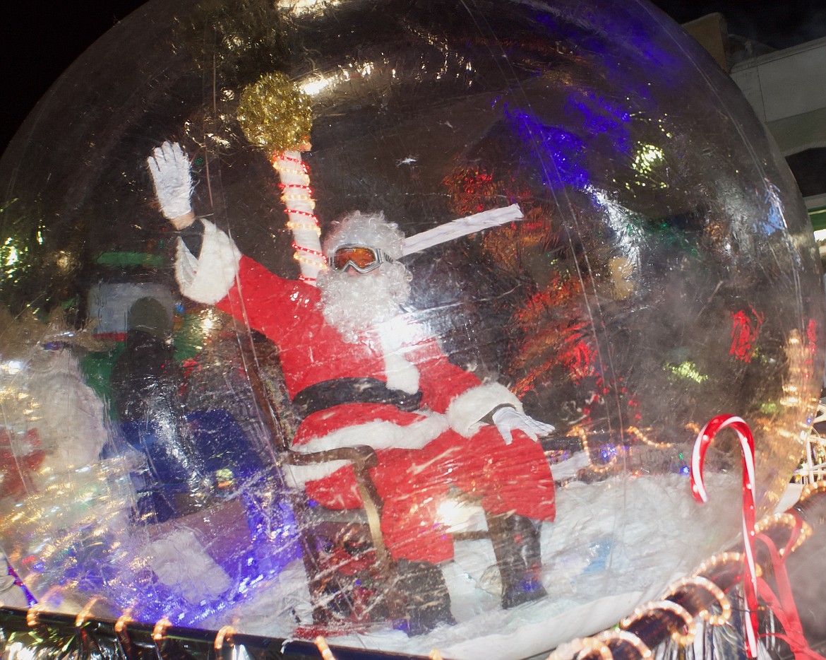 Santa made an an unconventional appearance at Polson's Parade of Lights last Friday. (Kristi Niemeyer/Lake County Leader)