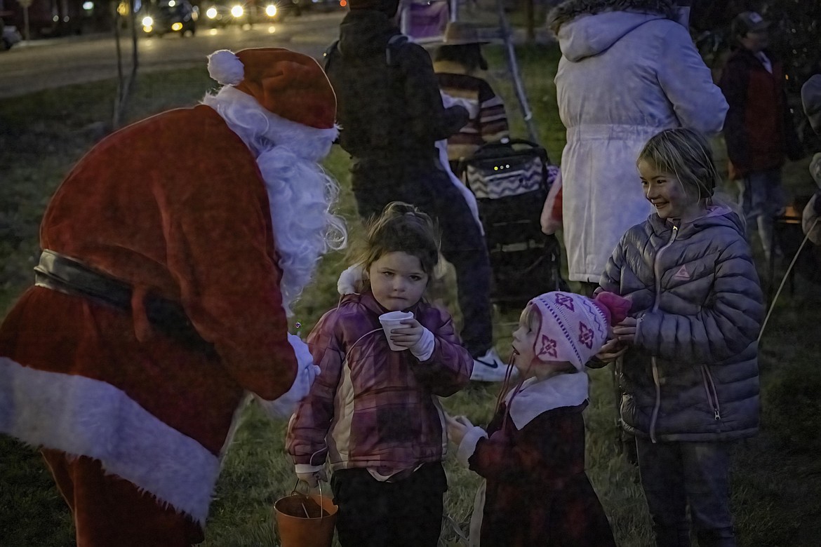 Children feel the excitement of meeting Santa Claus. (Tracy Scott/Valley Press)