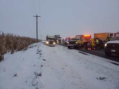 A tractor-trailer avoided the wreck by driving into the ditch.