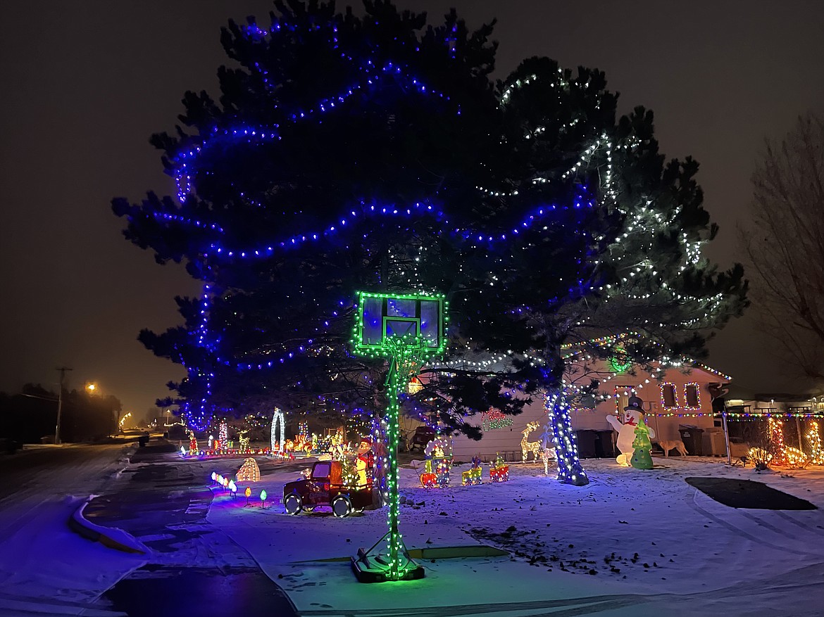 Brady Wiltbank won first place in the residential division of Light Up Moses Lake 2021 for his colorful and elaborate display, even decorating the basketball hoop. Registration is now open for Light Up Moses Lake 2022.