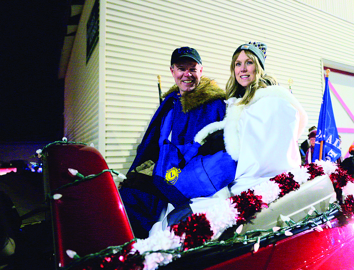 Cary and Angie Finberg were the king and queen of the Night of Lights Parade Friday. (Chris Peterson photo)