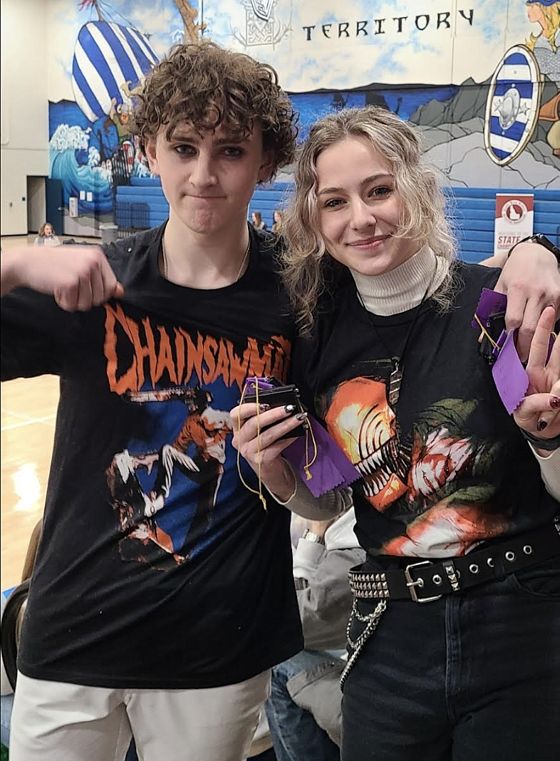 Coeur d'Alene Charter Academy sophomore Nick Ohmes and senior Daisy Ohmes celebrate their state titles in costume design at the 2022 IHSAA Drama Championships last weekend.