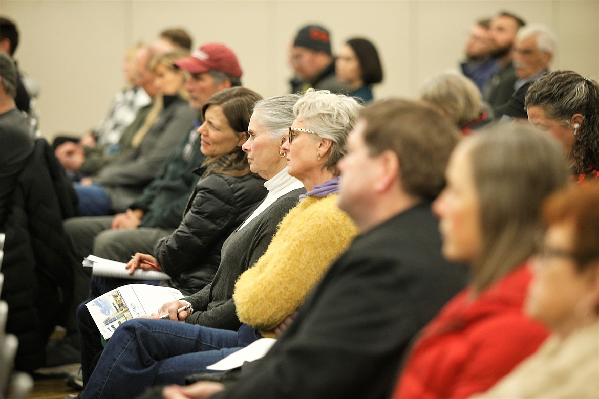 People listen during Thursday's informational meeting at the Best Western Plus Coeur d'Alene Inn on Kootenai Health proposed transition to a nonprofit status.