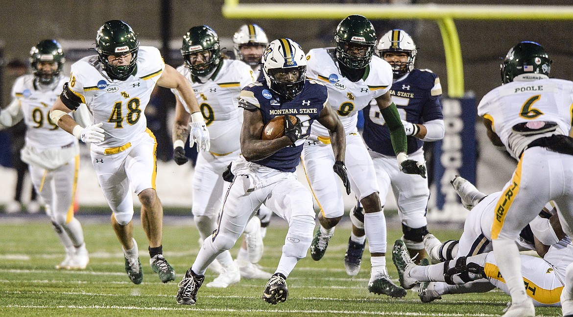 Montana State running back Isaiah Ifanse runs the ball in the first half against William & Mary in the first half during an NCAA college football game Friday, Dec. 9, at Bobcat Stadium in Bozeman, Mont. (Rachel Leathe/Bozeman Daily Chronicle via AP)