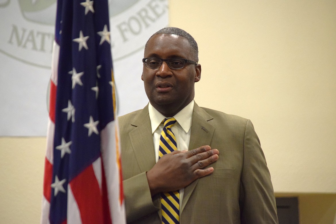 Columbia Basin Job Corps Center Director Maynard Spell says the pledge of allegiance at the start of the center’s first public graduation ceremony on Friday since the outbreak of COVID-19 in early 2020.