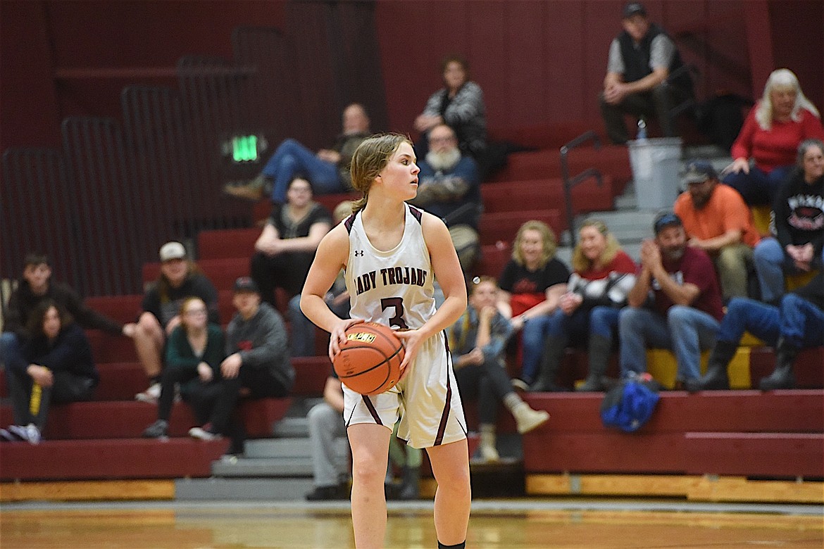 Troy senior Isabelle Tunison sizes up the Noxon defense on Saturday night. (Scott Shindledecker/The Western News)