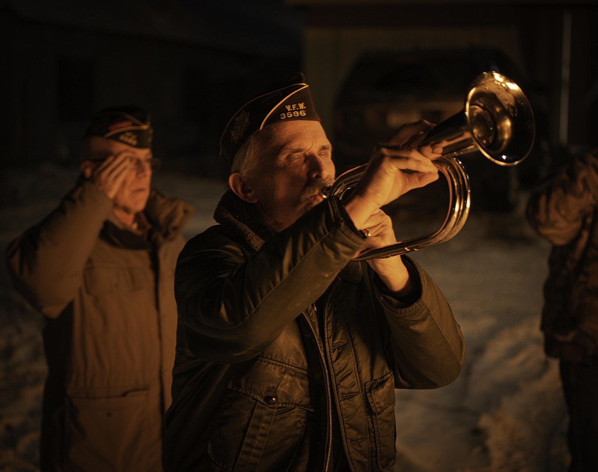 Veteran Ron Chisenhall plays the bugle at a flag retirement ceremony in Plains. (Tracy Scott/Valley Press)