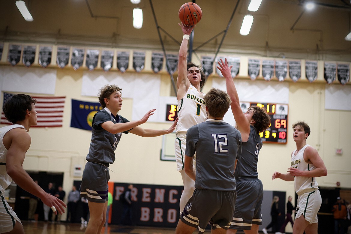 Whitefish's Josh Downie pulls up for a jumper late in the second overtime against Park at the Frenchtown Tip-Off Tournament Friday, Dec. 9. (Jeremy Weber/Daily Inter Lake)