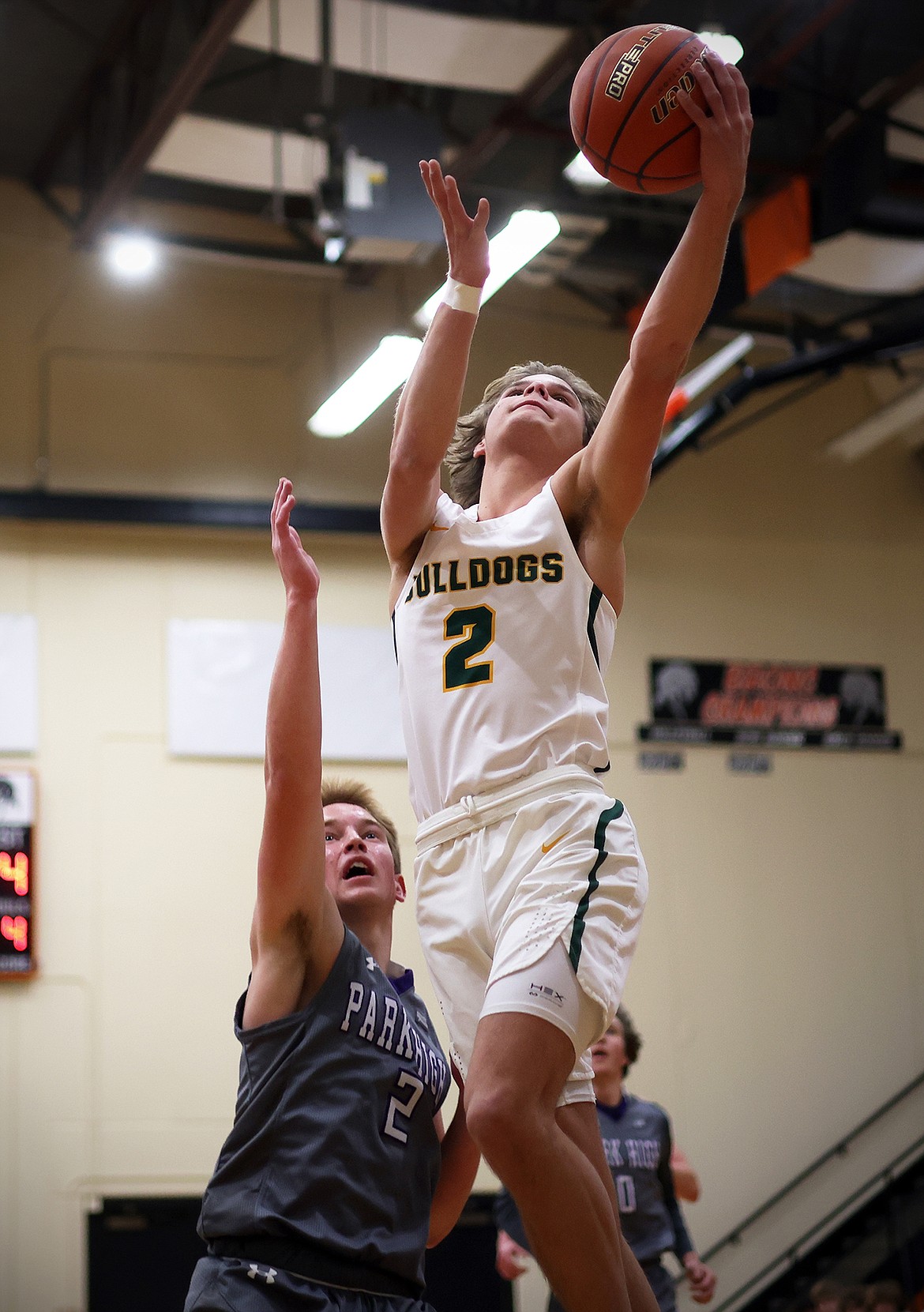 Whitefish's Mason Genovese drives in for a layup against Park during action at the Frenchtown Tip-Off Tournament Friday, Dec. 9. (Jeremy Weber/Daily Inter Lake)