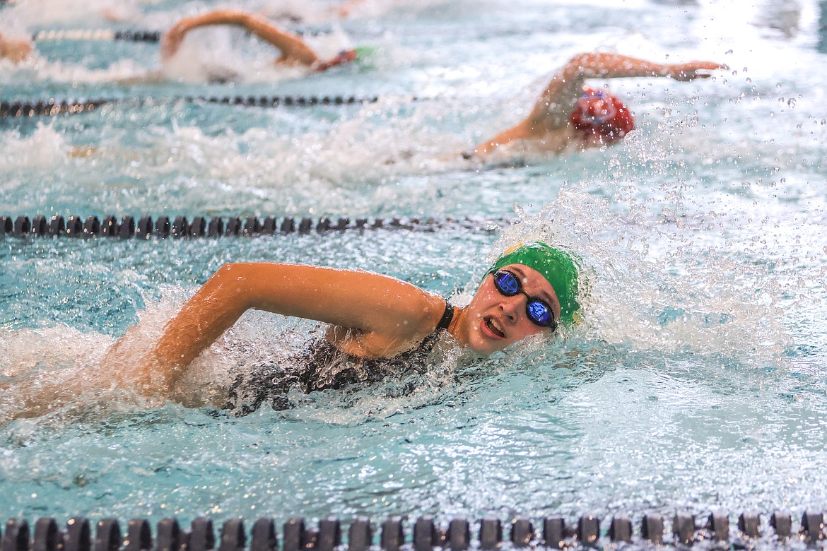 Whitefish senior Adeline Taylor completes in a freestyle event at the Kalispell Invite on Saturday. (JP Edge photo)