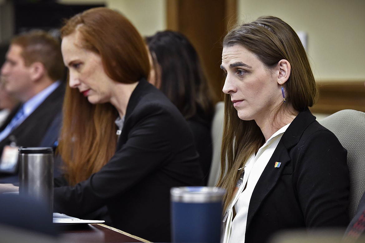 Zooey Zephyr, right, attends a legislative training session at the state Capitol in Helena, Mont., on Nov. 16, 2022. Zephyr, who is one of the first two transgender candidates elected to the Montana Legislature, says she hopes her presence will help fellow lawmakers better understand the trans community and lead them to avoid proposing legislation that can legitimize violence against the transgender community. (Thom Bridge/Independent Record via AP)