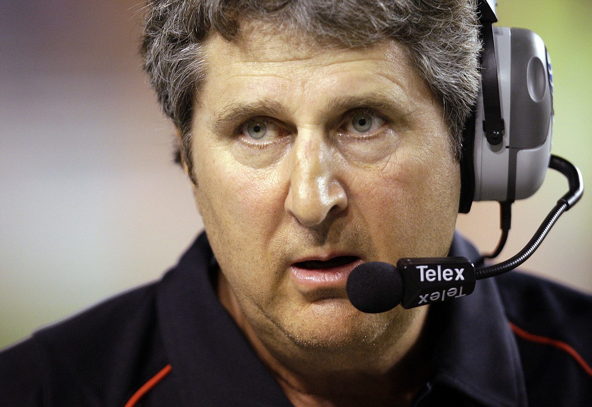 FILE - Texas Tech coach Mike Leach waits as a play is reviewed during the first quarter of their NCAA college football game against Texas in Austin, Texas, Sept. 19, 2009. Mike Leach, the gruff, pioneering and unfiltered college football coach who helped revolutionize the passing game with the Air Raid offense, has died following complications from a heart condition, Mississippi State said Tuesday, Dec. 13, 2022. He was 61.