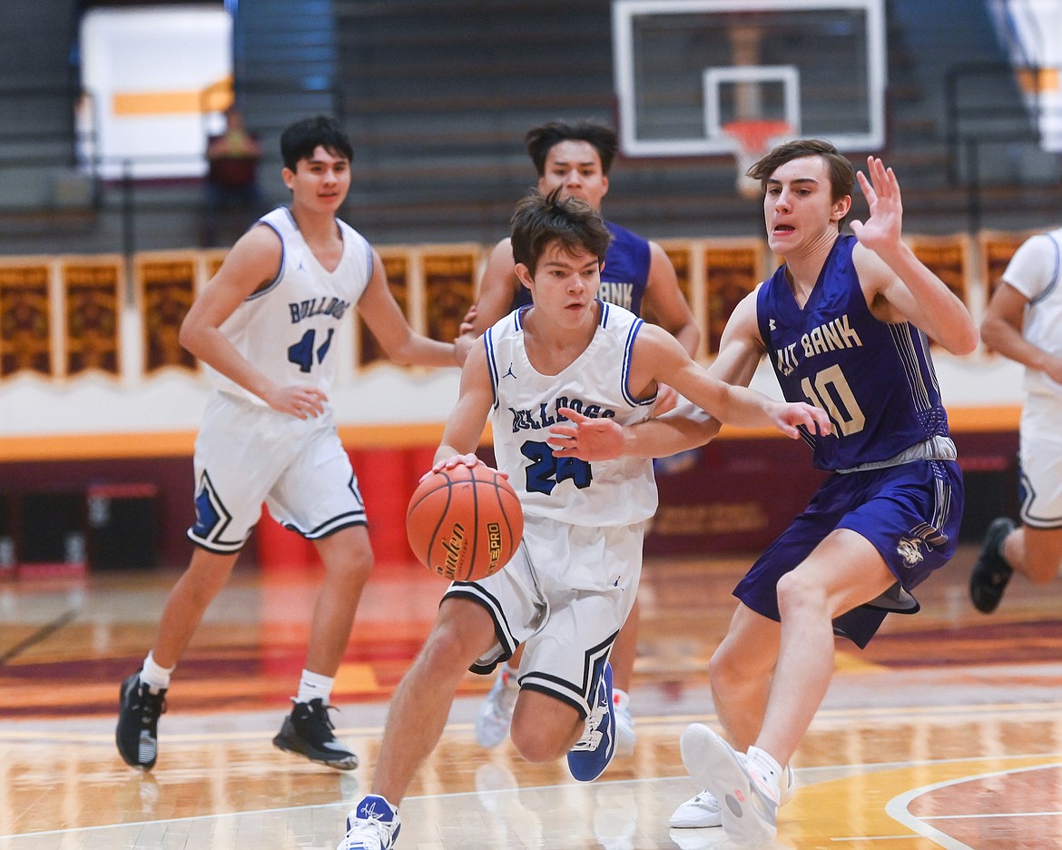 The Mission Bulldogs fell to Cut Bank, 50-60, in Shelby during last weekend's Coyote Classic. (Christa Umphrey photo)