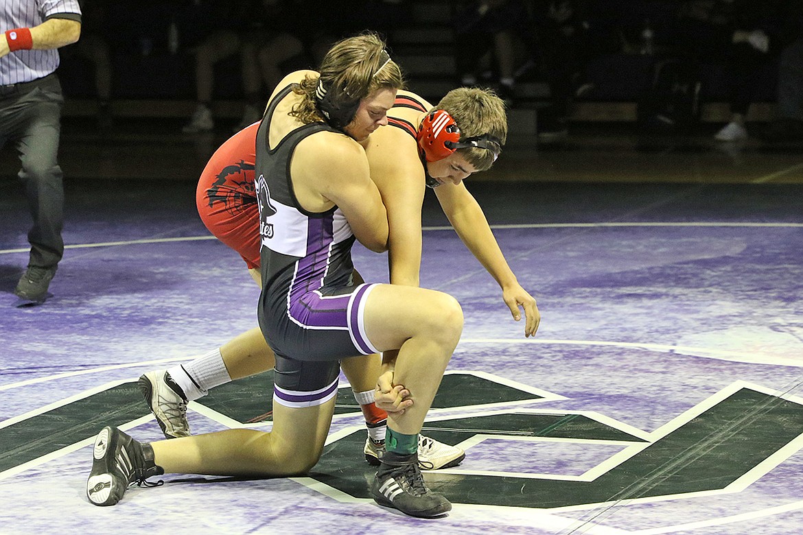 Polson's Jack Sherry toppled Isaac Flamand of Browning in the 160-pound class. (Bob Gunderson photo)