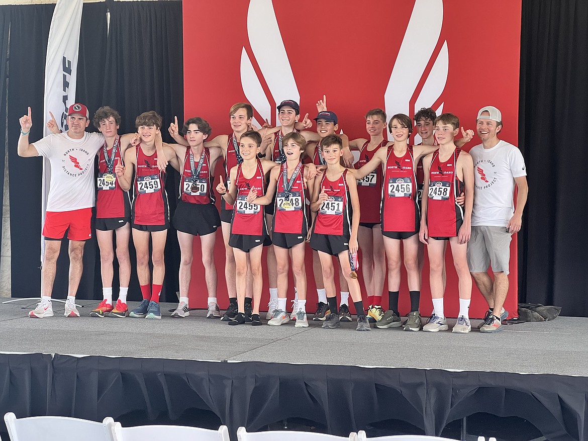 Courtesy photo
The North Idaho Distance Project boys age 13-14 team won a national championship at the USATF National Junior Olympic Cross Country Championships on Dec. 10 in College Station, Texas. In the front row from left are Blaise Howard, Davey Dance and Wyatt Morgenstern; and back row from left, head coach Emry Carr, Parker Sterling, Payson Shaw, Ronan Kennedy, Brayden Osterdock, Wyatt Carr, Mitchell Rietze, Charlie Mattila, Sam Mandel, Gabriel Heule, Samuel Reade and coach David Dance.