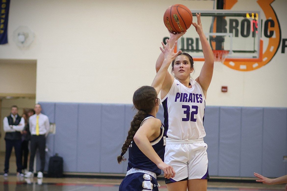 Polson senior Mila Hawk eyes a shot at the Frenchtown Tip-Off Tournament on Friday. (Jeremy Weber/Bigfork Eagle)