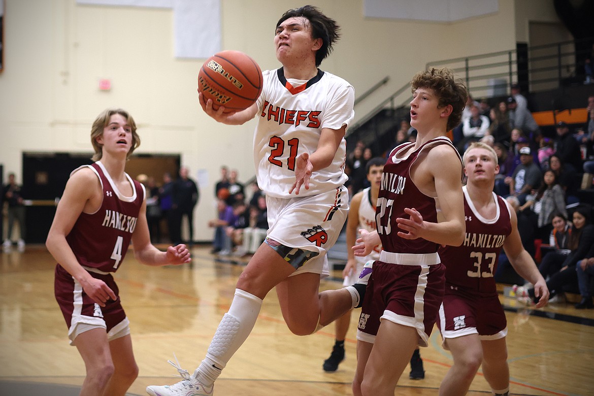 The Ronan boys basketball team takes on Hamilton at the Frenchtown Tip Off Tournament. (Jeremy Weber/Bigfork Eagle)