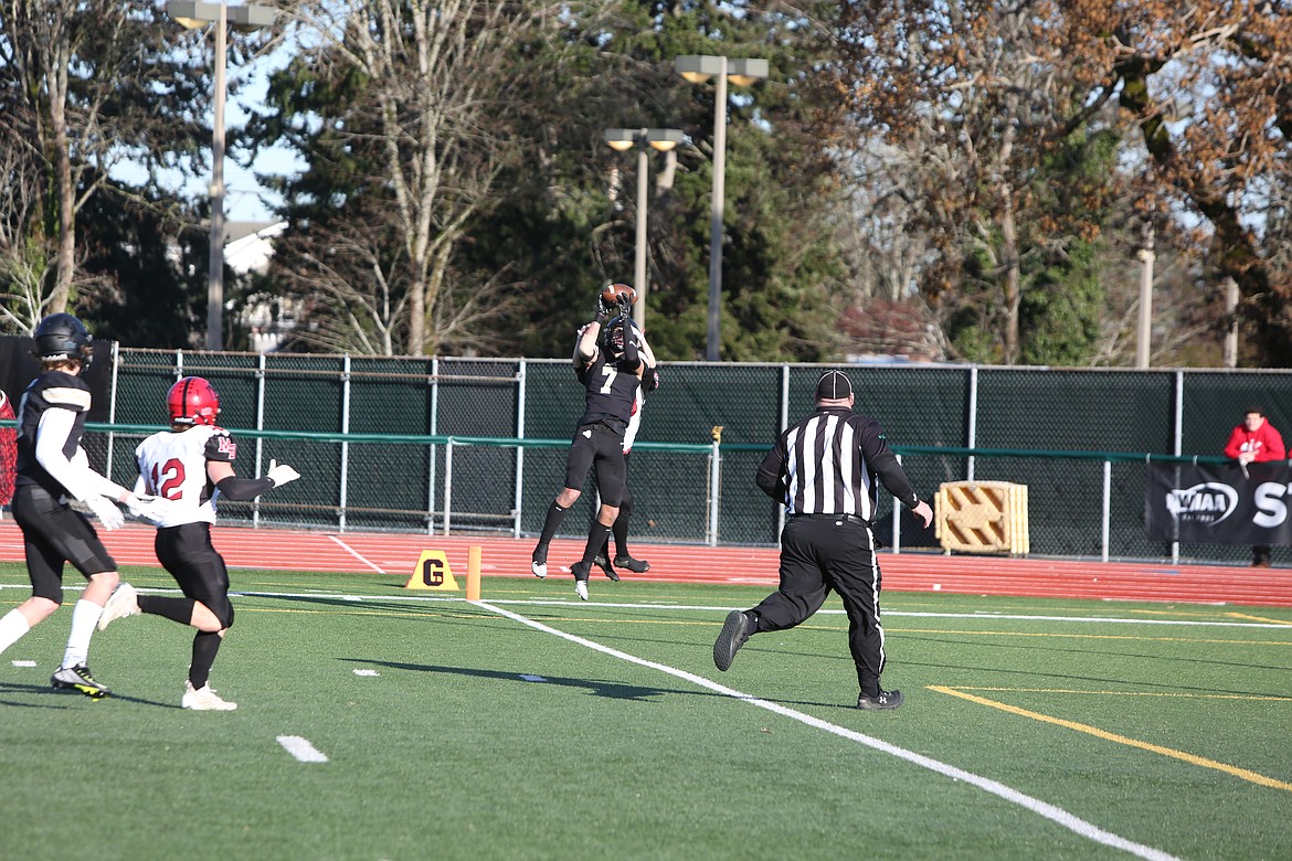 Royal senior receiver Edgar De La Rosa intercepts a Mount Baker pass in the end zone during the third quarter of the Knight’s 35-20 1A Gridiron Classic win. De La Rosa intercepted two passes in the win.