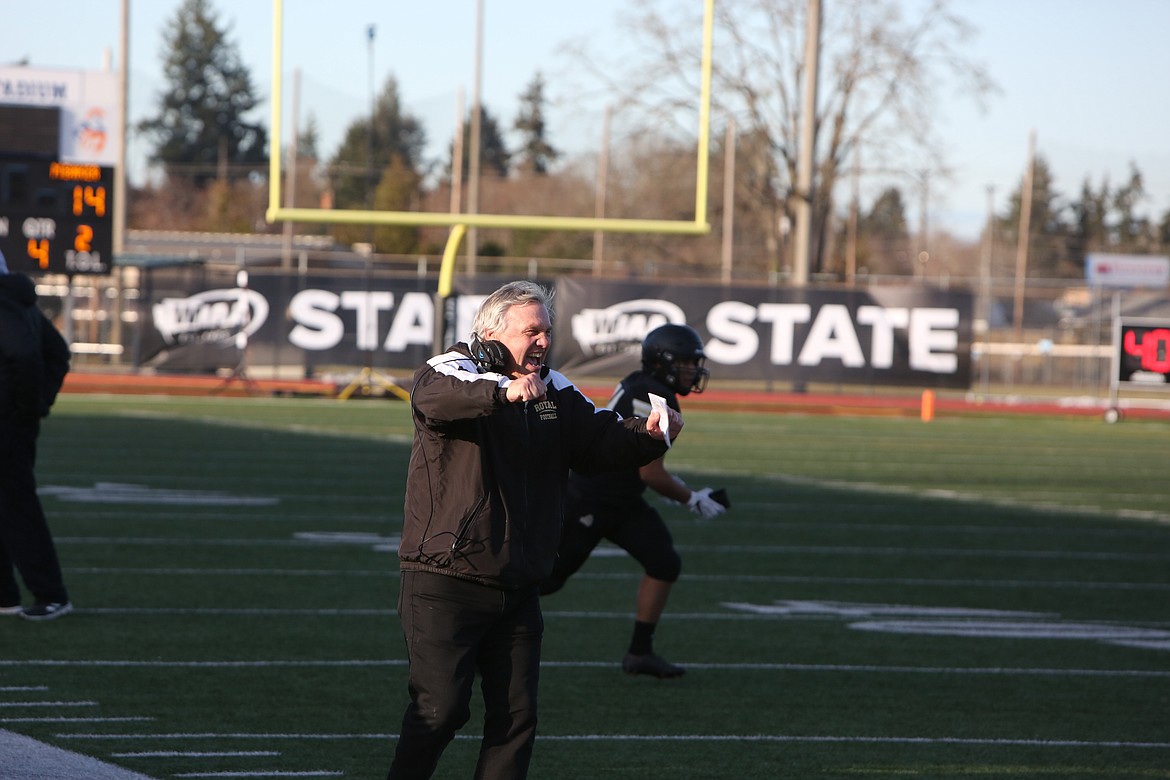 After a late rushing touchdown by quarterback Dylan Allred, Wiley Allred celebrates on the sideline during the 2022 1A state title game.