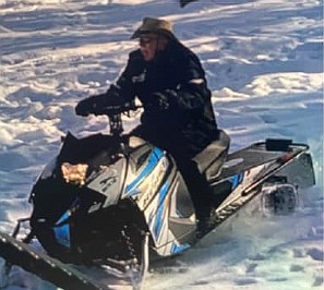 A photograph of 87-year-old Charles Kind on a snowmobile. Authorities say he was expected back at 2 p.m., Dec. 13. (Photo courtesy the Flathead County Sheriff's Office)