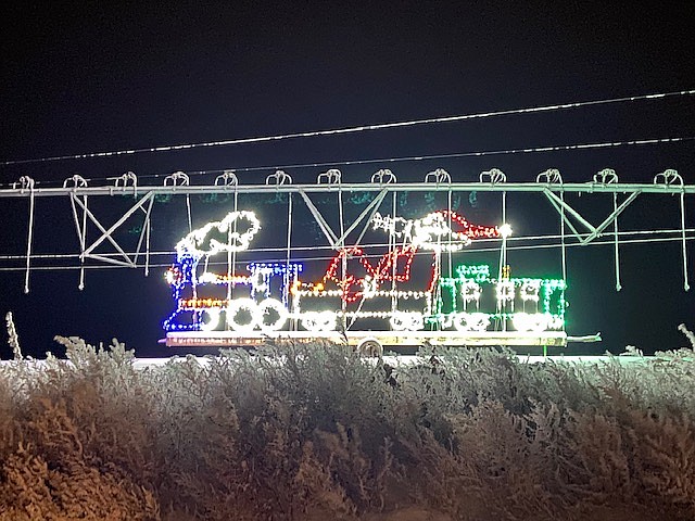 Many of The Lights of Christmas's displays are mounted on farm equipment such as irrigation hardware or other tools of the trade.