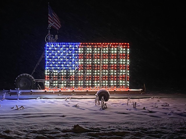 The flag shown here includes about 11,000 LEDs to make up this patriotic display of Christmas spirit.