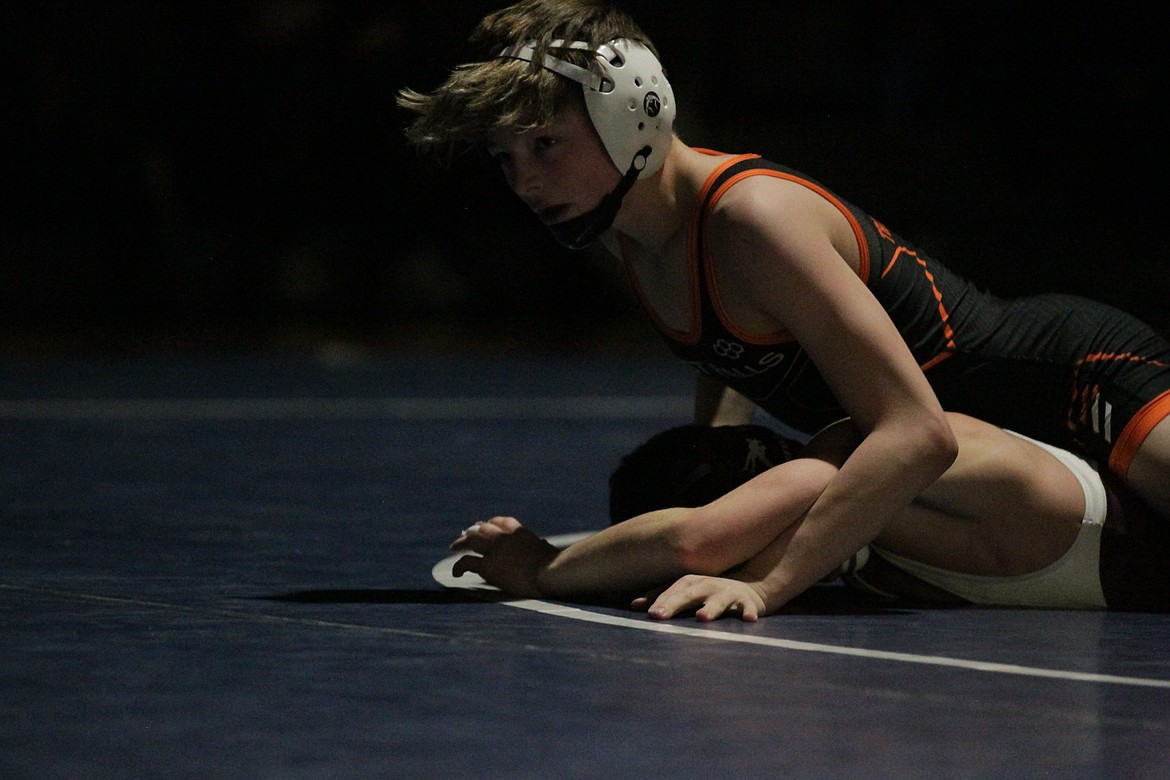 JASON ELLIOTT/Press
Post Falls sophomore Rider Seguine looks to the official during the 98-pound championship match at the Tri-State Invitational on Saturday at North Idaho College.