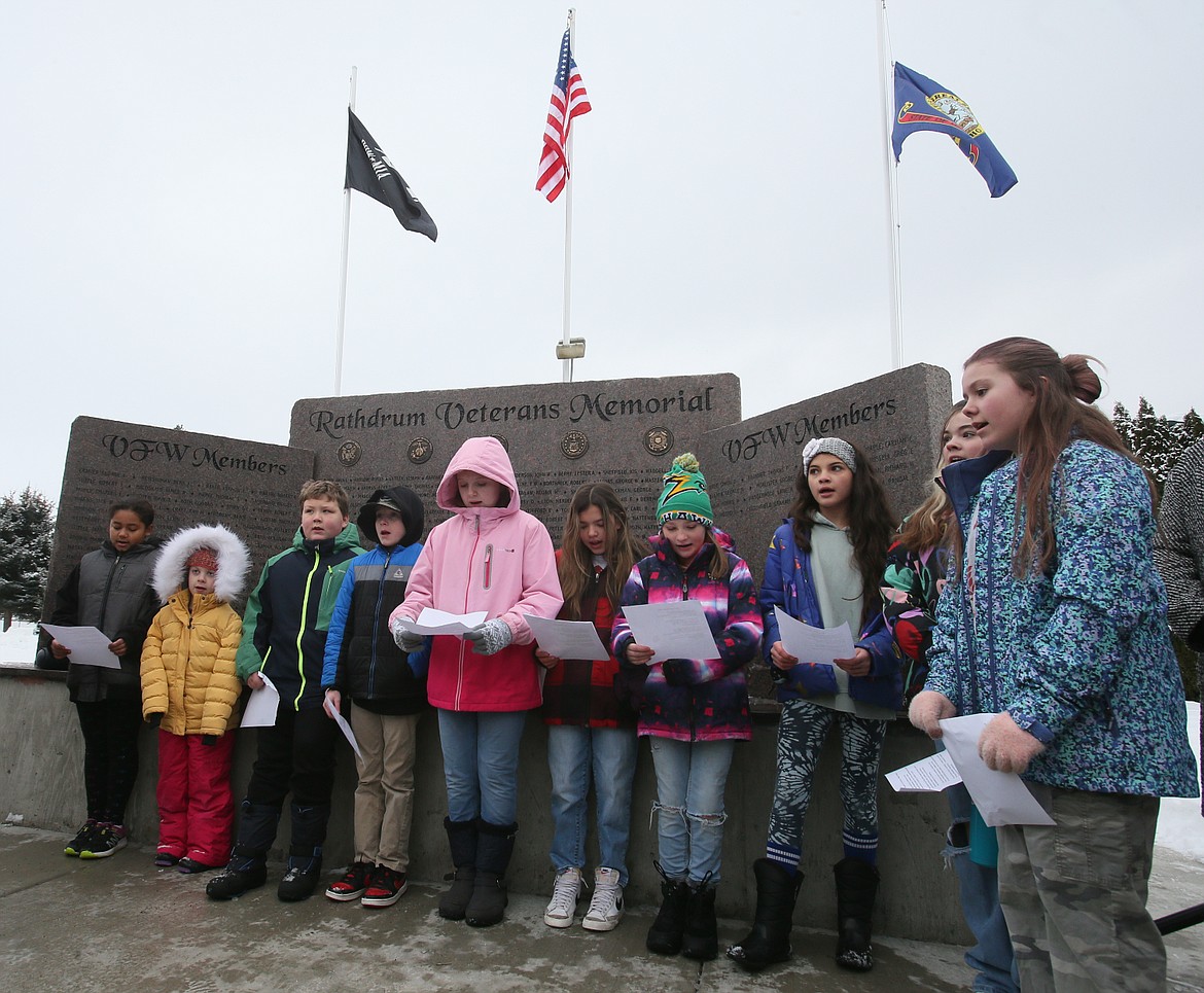 Students from John Brown Elementary perform "Thank a Vet" Saturday morning during the Wreaths Across America ceremony in Rathdrum.