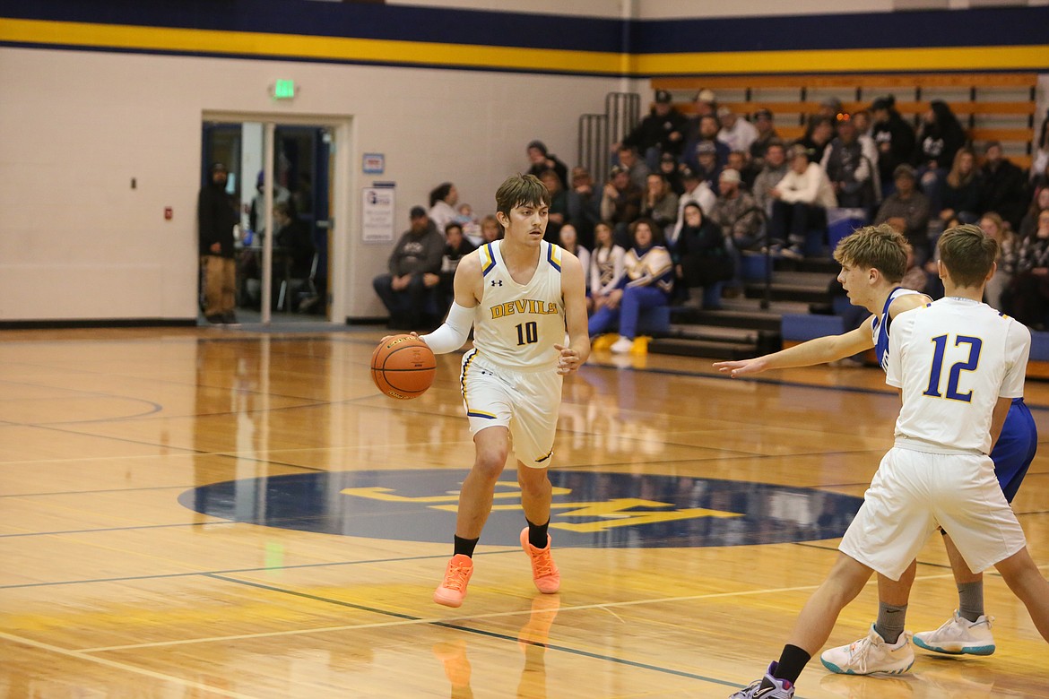 Wilson Creek junior Zane McMillan (10) scored 20 of the Devils’ 37 points on Friday night.