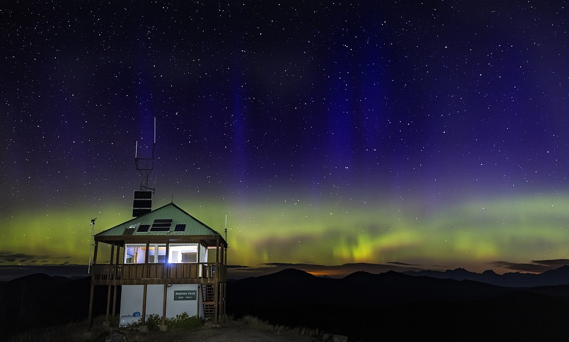 Northern Lights over Werner Peak Fire Lookout Tower in the Stillwater State Forest, Montana. (Chuck Haney photo)