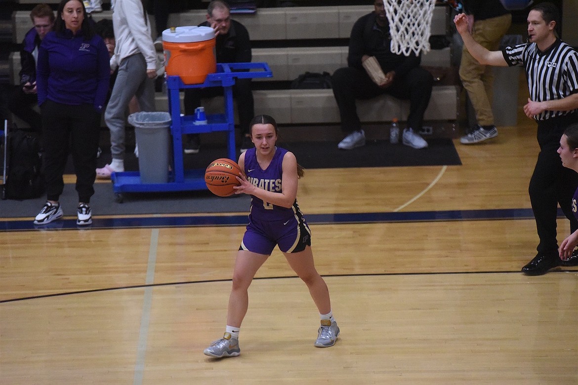 Lady Pirate Julia Barnard looks for the pass in Saturday's game against Libby. (Scott Shindledecker/The Western News)