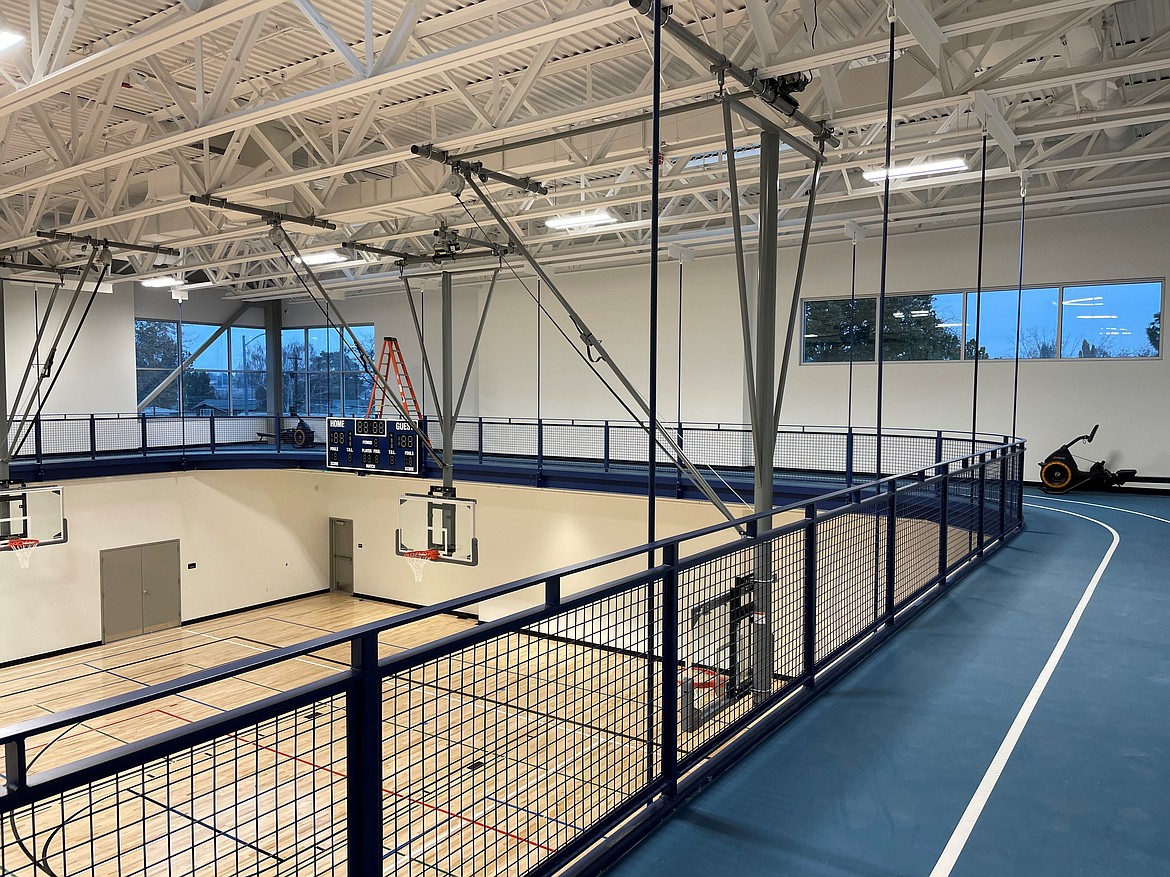 The newly-built Larson Recreation Center has several physical fitness facilities incorporated into it, including a walking track that overlooks basketball courts.