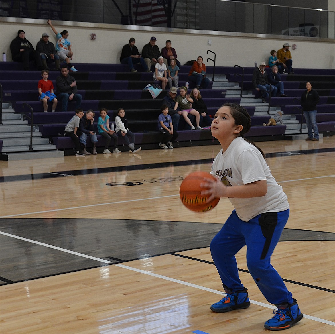 Asher Caye takes aim at the basket during the Elks Hoop Shoot Saturday in Polson. He claimed first place in the boys' 8-9 age group. (Kristi Niemeyer/Lake County Leader)