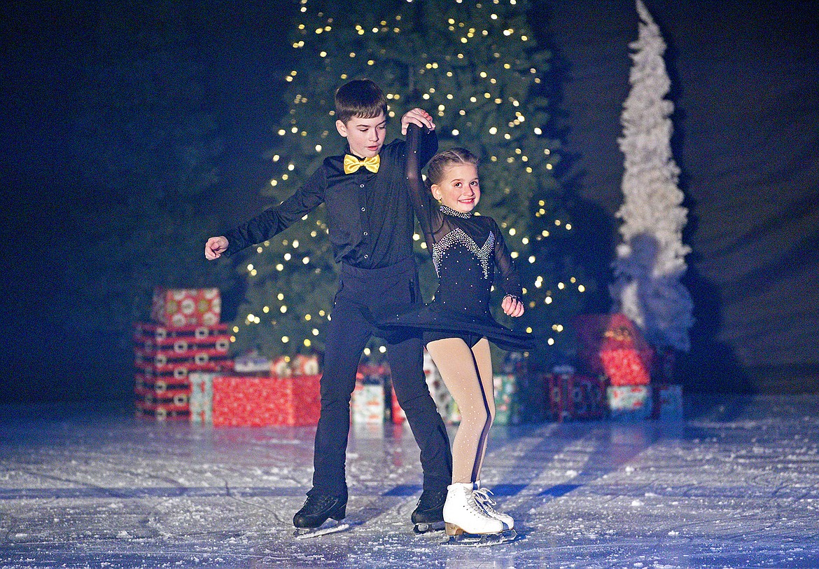 Siblings Barrett and Audrey Heslop perform together during the Glacier Skate Academy show 'Winter Wonderland on Ice' at the Stumptown Ice Den on Saturday. (Whitney England/Whitefish Pilot)