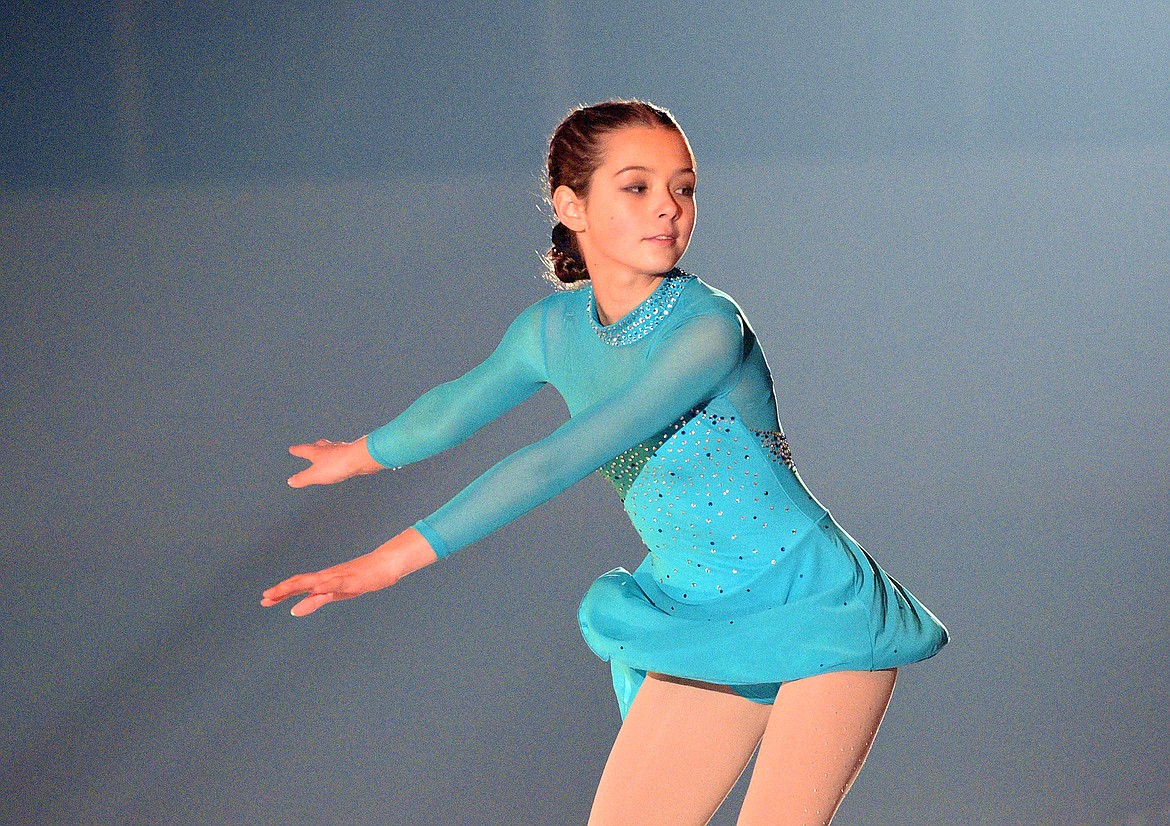 Ice skater Kalea Squires performs during the Glacier Skate Academy show 'Winter Wonderland on Ice' at the Stumptown Ice Den on Saturday. (Whitney England/Whitefish Pilot)