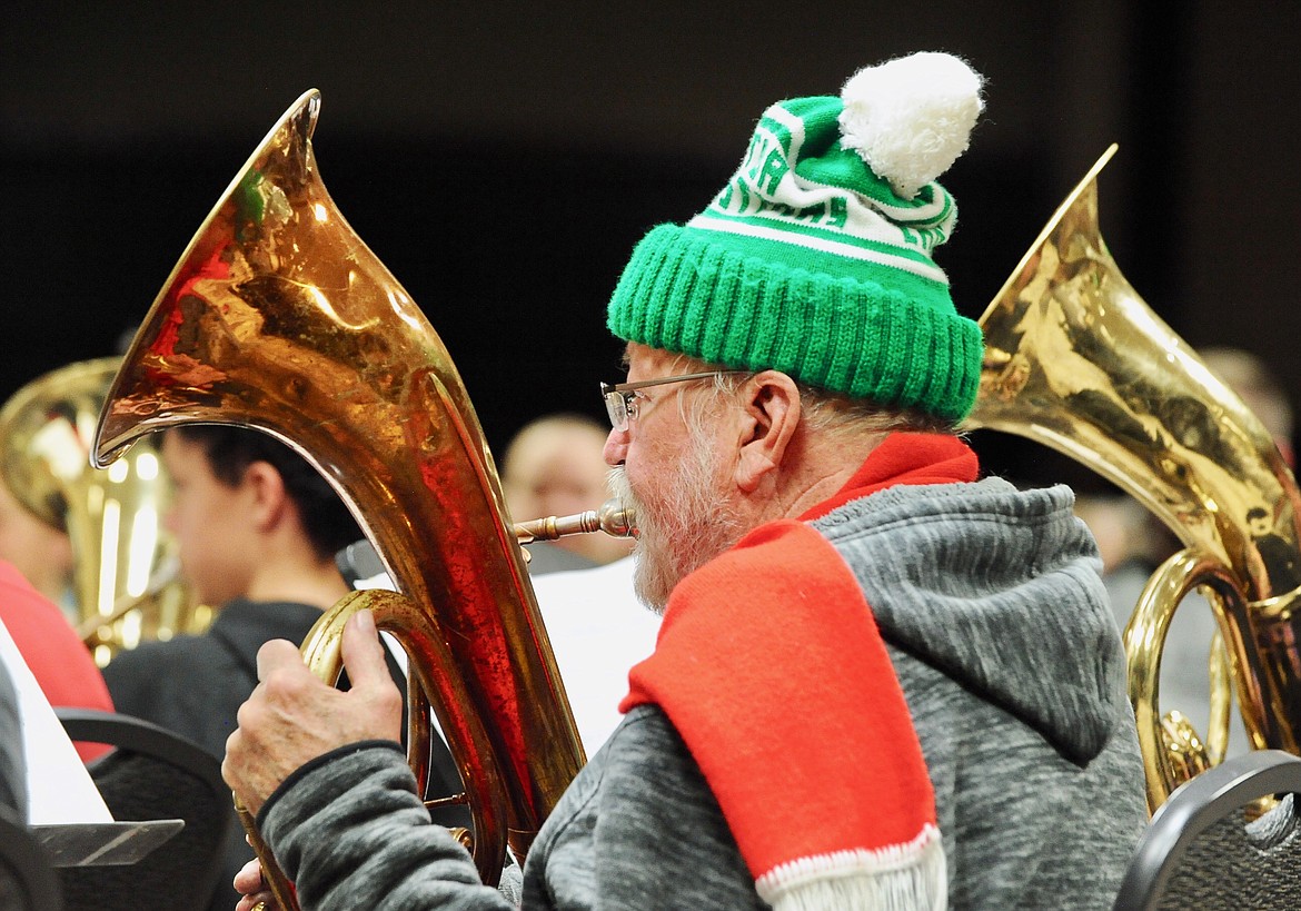Ahti Mohala plays during the TubaChristmas concert Monday evening at the Red Lion Hotel in Kalispell. This was his sixth year playing in the concert that he says is “really, really fun.” (Heidi Desch/Daily Inter Lake)