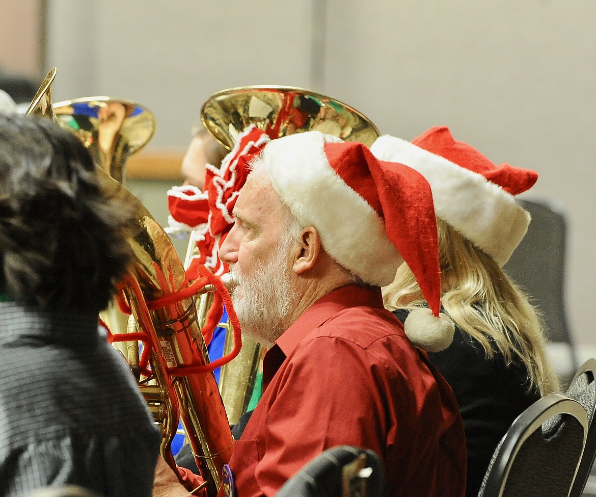 Marty Weimer plays during the TubaChristmas concert Monday at the Red Lion Hotel. (Heidi Desch/Daily Inter Lake)