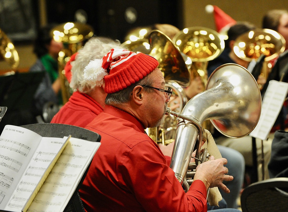 The one-day band performs the TubaChristmas concert at the Red Lion Hotel Monday evening. (Heidi Desch/Daily Inter Lake)