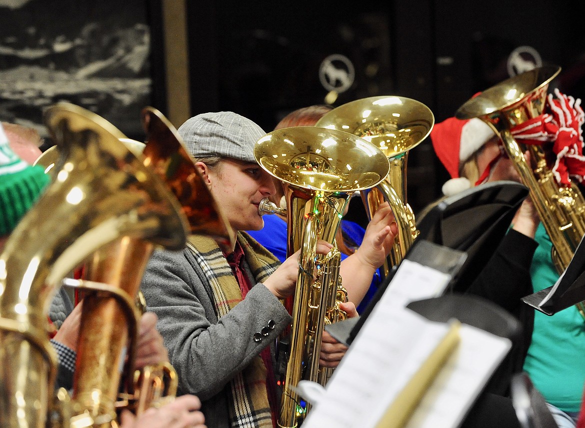 Joshua Edelen plays during the TubaChristmas concert at the Red Lion Hotel Monday evening. (Heidi Desch/Daily Inter Lake)