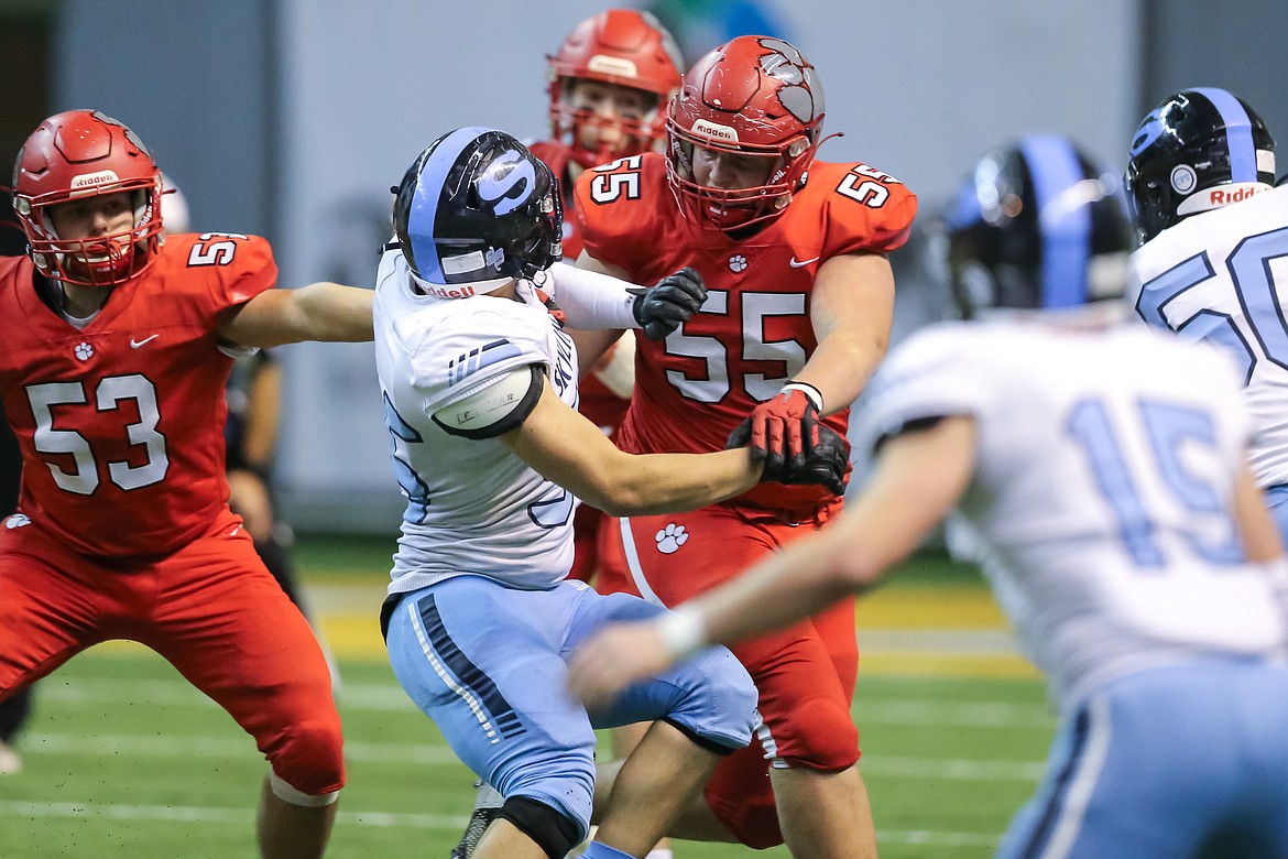 Carson Laybourne of Sandpoint High School rushes in for the tackle against Skyline. Laybourne was recently selected for First Team All-Idaho.