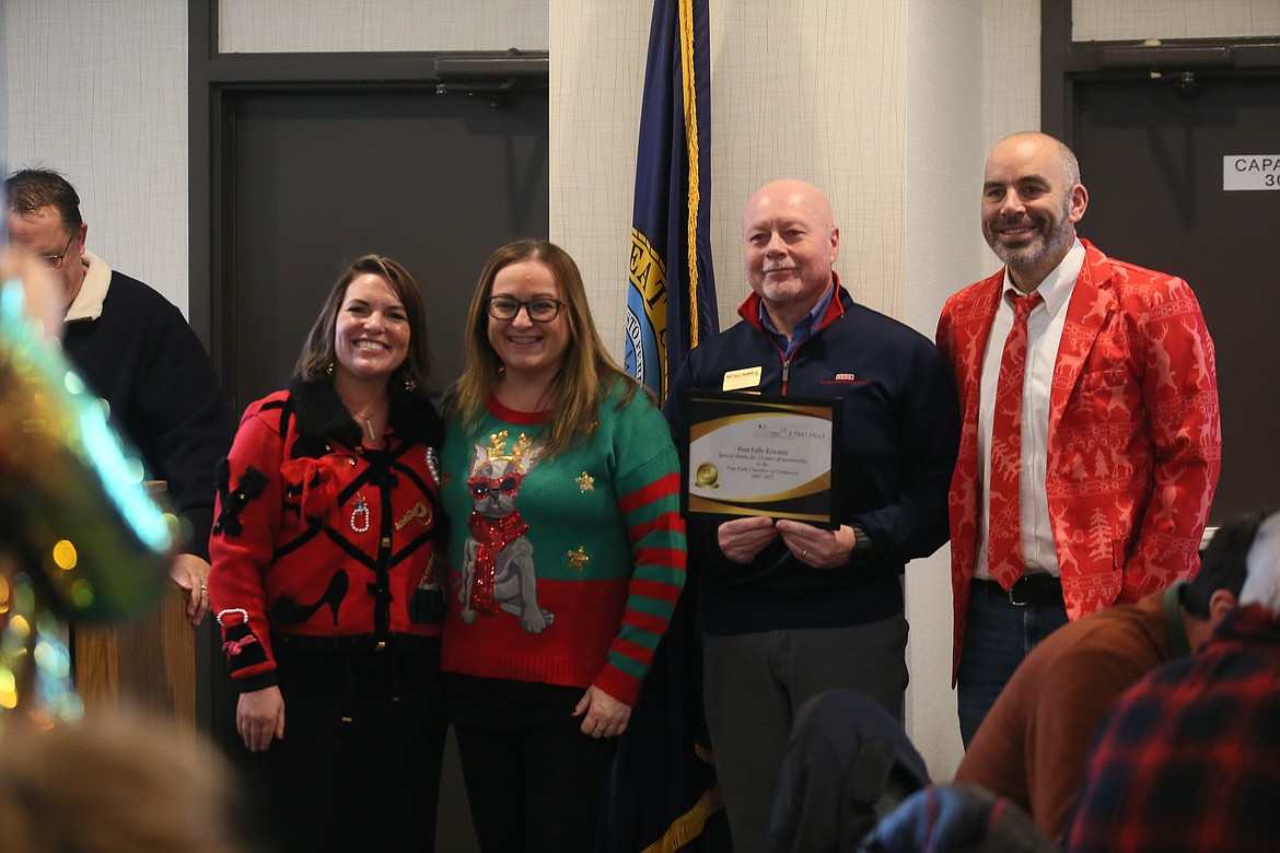 The Post Falls Kiwanis was honored for being a Post Falls Chamber member for 15 years during the chamber's annual meeting Tuesday. From left: Chamber President Christina Petit and Kiwanis members RaeAnne Capaul, Jerry Lyon and Tavis Throm.