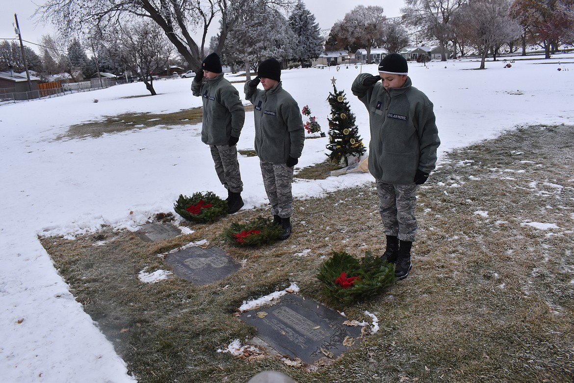 Some of the few uncovered veterans’ graves were laid with wreaths by cadets of the Columbia Basin Composite Squadron of the Civil Air Patrol.