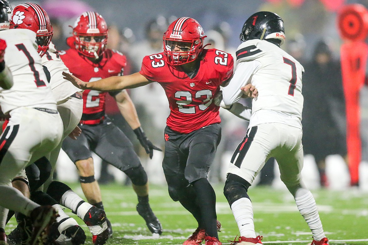 Wes Benefield breaking through in the Bulldog's playoff game against Shelley Russet. Benefield was just named to the All-State First Team for Idaho.