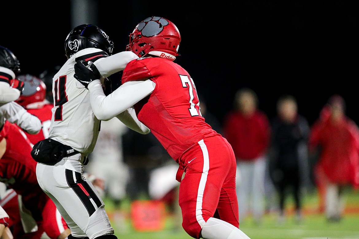 Wylan Dorrel goes up against Shelley Russet's running back. Dorrell was named First-Team All-State for the first time.