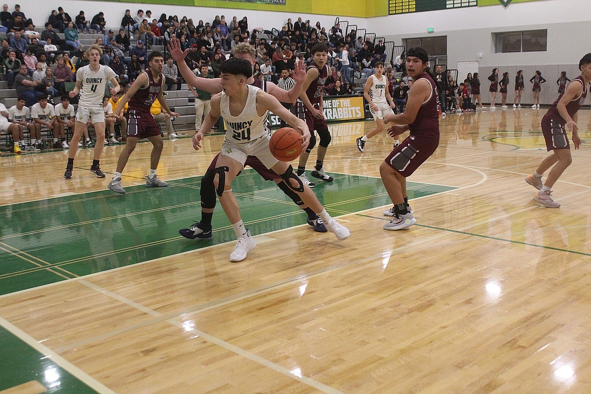 After transferring to Quincy from Omak, junior Julian Ibarra (24) has been averaging 25 points per game through Quincy’s first six games on the year.