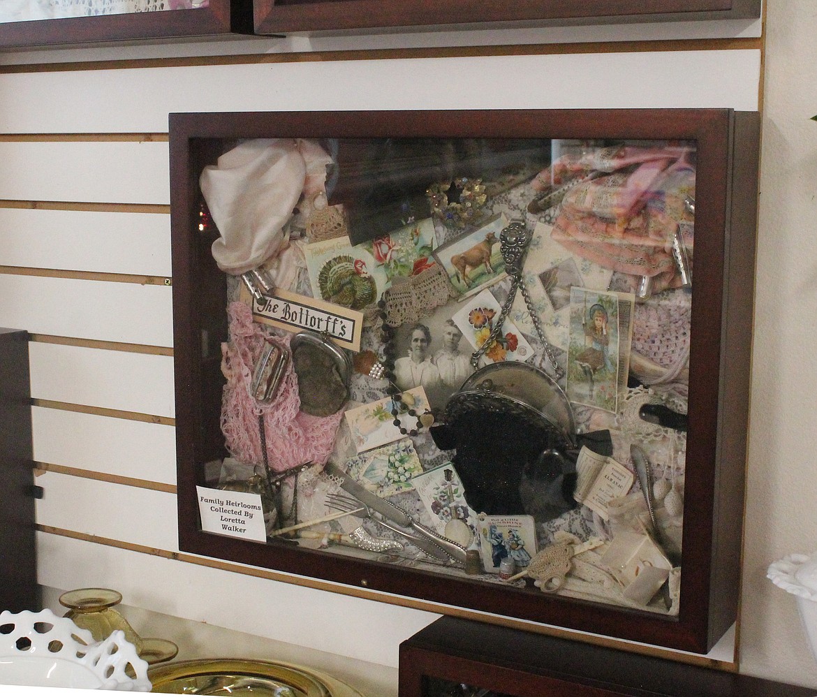 On display at Java Bloom are memory boxes with heirlooms and artifacts from about a century and a half of Patricia Hulett’s family history