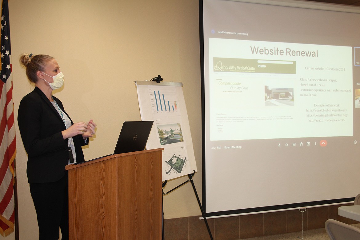 Quincy Valley Medical Center community relations and marketing director Shannon Durfee discusses possible changes to the QVMC website with commissioners Monday.