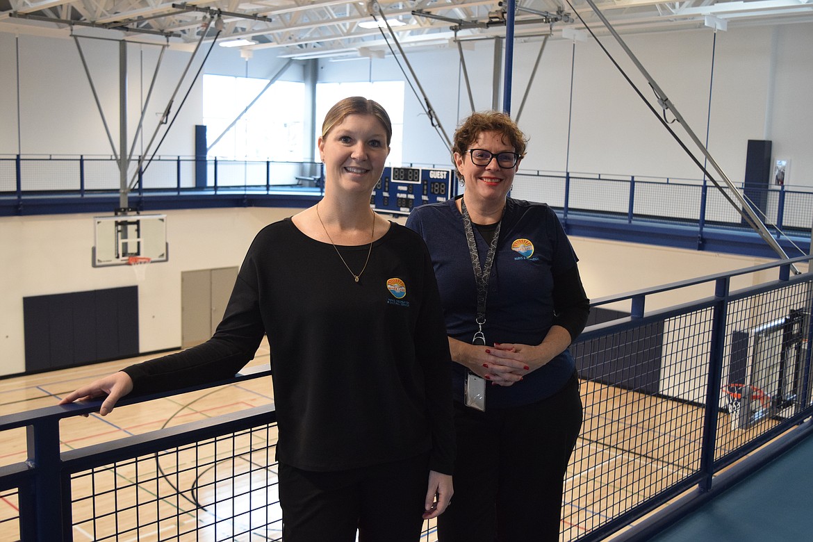 City of Moses Lake Recreation Supervisor Carrie Hoiness and Interim Director of the Parks, Recreation and Cultural Services Department Dollie Boyd stand on the walking/running track overlooking the gym in the city’s new Larson Recreation Center, which opened on Thursday. Boyd and Hoiness are just two of many city staff that worked to bring the community center to fruition.